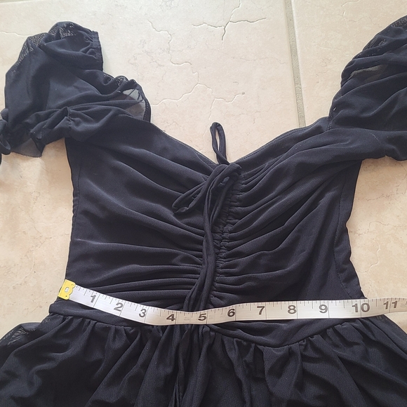 Elegant Black Dress with Sheer Sleeves - Picture 8 of 14